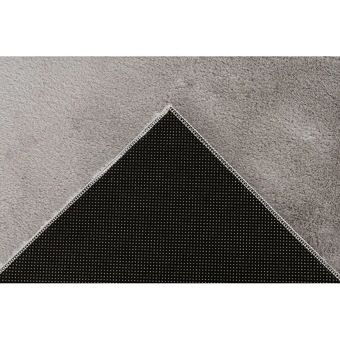 Kayoom Fellteppich Emperor 525 - Silber, 230 x 160 cm, 100 % Polyester - Grauer Kunstfellteppich mit weicher Oberseite und schwarzer Anti-Rutsch-Unterseite mit Punkten.