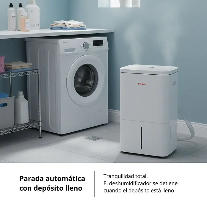 Corberó Deshumidificador eléctrico CDG80 - 1.252 W, Potencia de deshumidificación: 80 l/día, L x An x Al: 35 x 47 x 68 cm, Blanco - Deshumidificador blanco Corbera en funcionamiento en una lavandería junto a una lavadora.