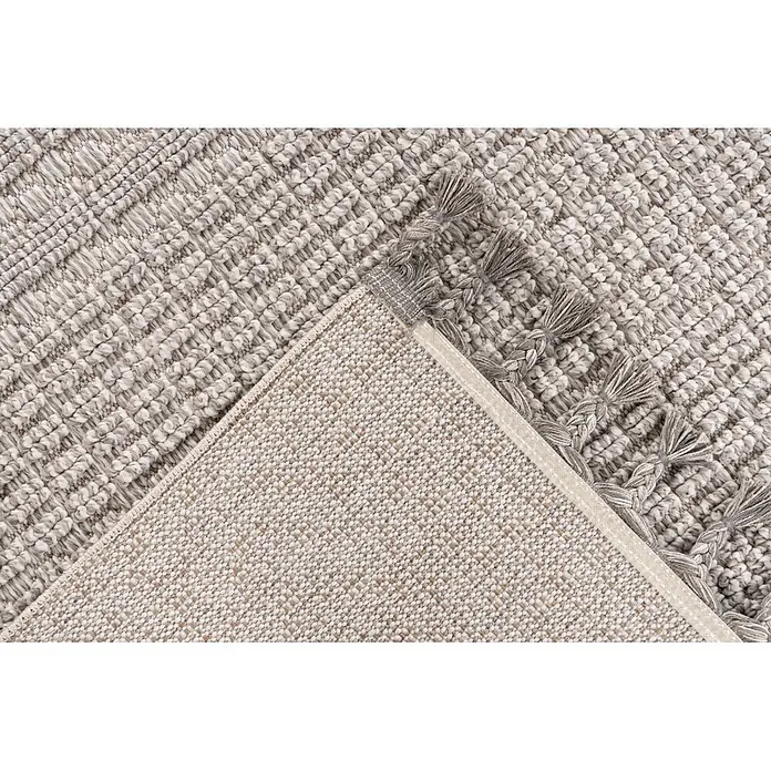Kayoom Fransenteppich Reef 125 - Silber, 150 x 80 cm, 100 % Polypropylen - Strukturierter hellgrau-weißer gemusterter Teppich mit sichtbarer Unterseite und Quasten.