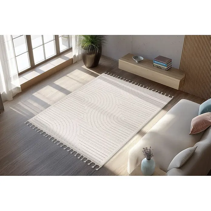 Kayoom Fransenteppich Reef 225 - Elfenbein, 150 x 80 cm, 100 % Polypropylen - Heller, cremefarbener Webteppich mit abstrakten Wellenmustern und Quasten auf Holzfußboden.