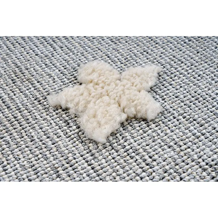 Kayoom Kinderteppich Modena 418 - Grau, 170 x 120 cm, 100 % Polypropylen - Weißes flauschiges Sternenstoffmuster auf einem grauen Webteppich.