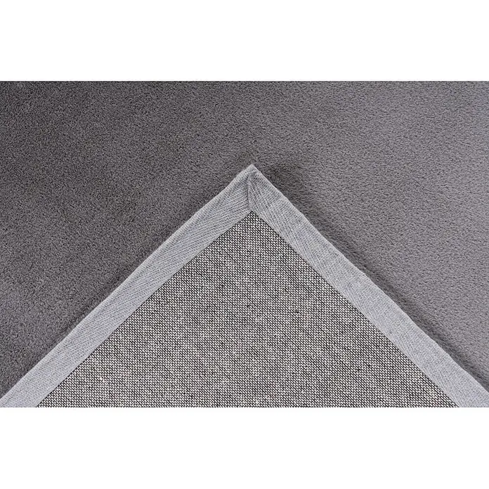 Kayoom Fellteppich Cross 425 - Silber, 170 x 120 cm, 100 % Polyester - Grauer Teppich mit weicher Oberfläche und gewebter Unterseite, Ecke umgeklappt, um hellgraue Einfassung zu zeigen.