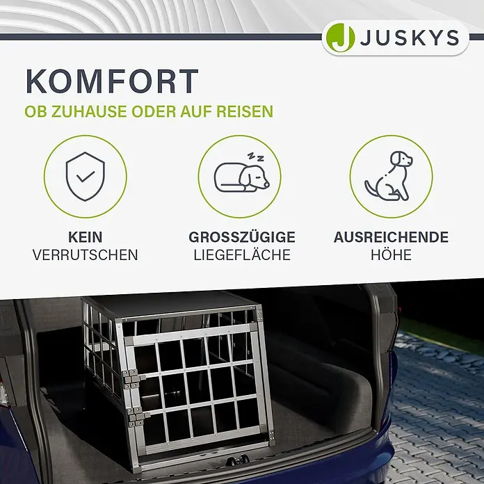Juskys Transportbox - 69 x 54 x 51 cm, Aluminium, Schwarz / Silber - Silberne Aluminium-Hundebox im Kofferraum eines blauen Autos.