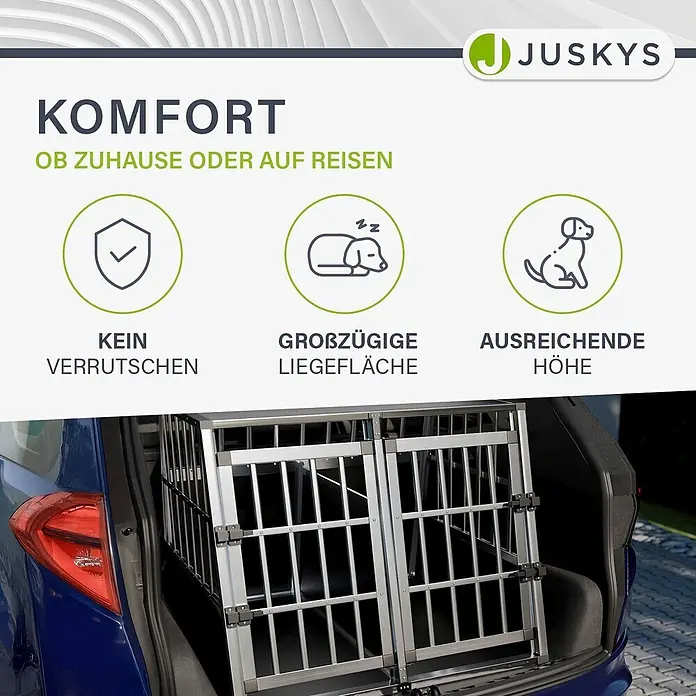 Juskys Transportbox - 90 x 96 x 71 cm, Aluminium, Schwarz / Silber - Silberne Hundebox sicher im Kofferraum eines Autos platziert, beworben mit "kein Verrutschen", "großzügige Liegefläche" und "ausreichende Höhe" für Komfort.