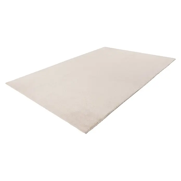 Kayoom Fellteppich Emperor 525 - Helltaupe, 290 x 200 cm, 100 % Polyester - Hellbeiger, rechteckiger Teppich mit weicher Textur, schräg dargestellt.