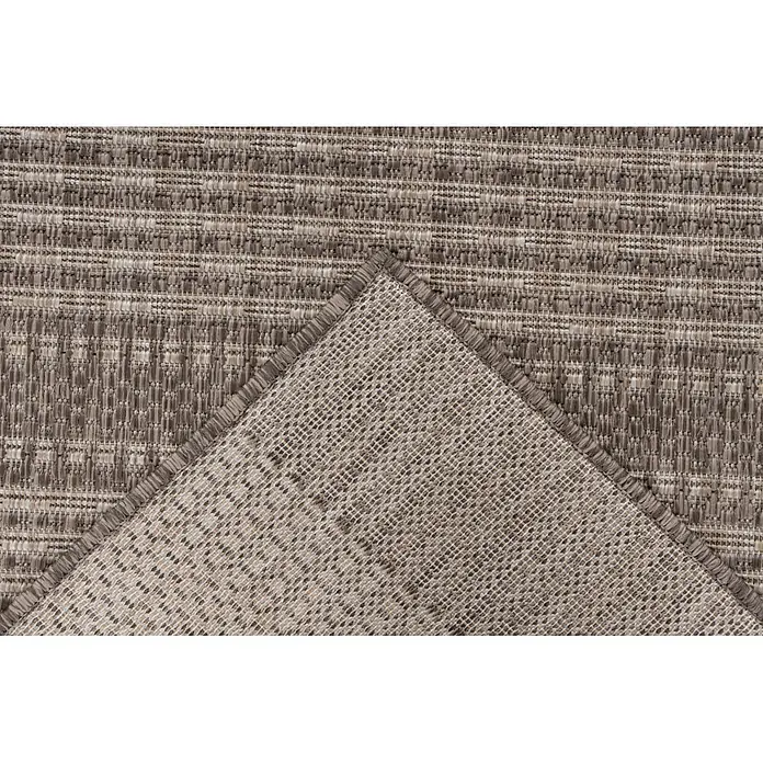 Kayoom Outdoor-Teppich Nibru 125 - Taupe, 290 x 200 cm, 100 % Polypropylen - Beiger und brauner gemusterter Teppich, Ecke umgeklappt, um gewebte Antirutschunterlage zu zeigen.