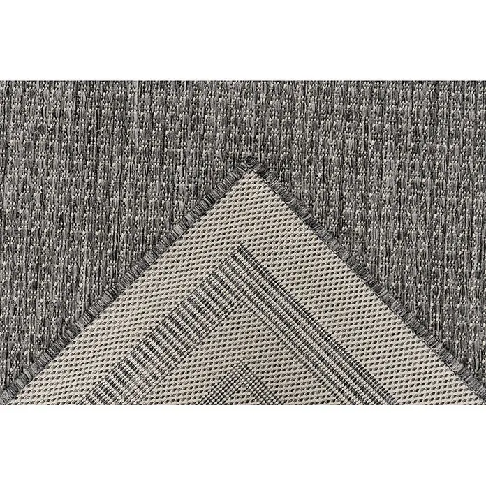 Kayoom Outdoor-Teppich Nibru 325 - Silber, 110 x 60 cm, 100 % Polypropylen - Nahaufnahme eines grau-weiß strukturierten Teppichs, gefaltet, um die beige-grau gewebte Rückseite mit diagonalem Muster zu zeigen.