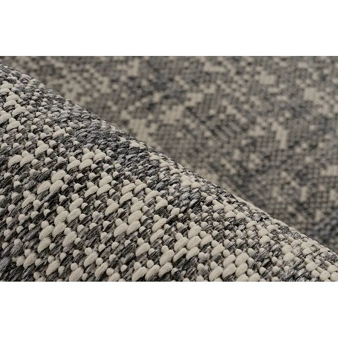 Kayoom Outdoor-Teppich Nibru 625 - Silber, 150 x 80 cm, 100 % Polypropylen - Nahaufnahme eines strukturierten grau-cremefarbenen Webteppichs mit unregelmäßigem Muster.