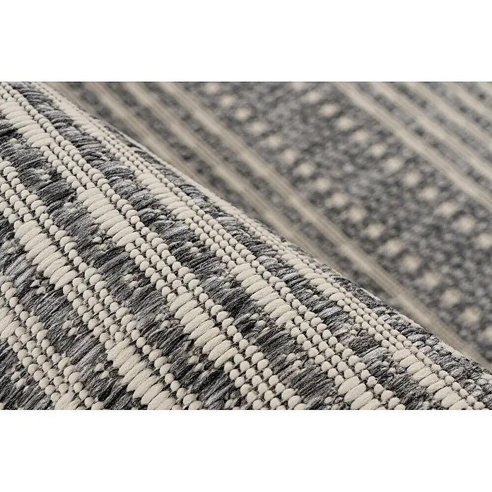 Kayoom Outdoor-Teppich Nibru 125 - Silber, 290 x 200 cm, 100 % Polypropylen - Strukturierter grau-cremefarbener Webteppich, teilweise gerollt.