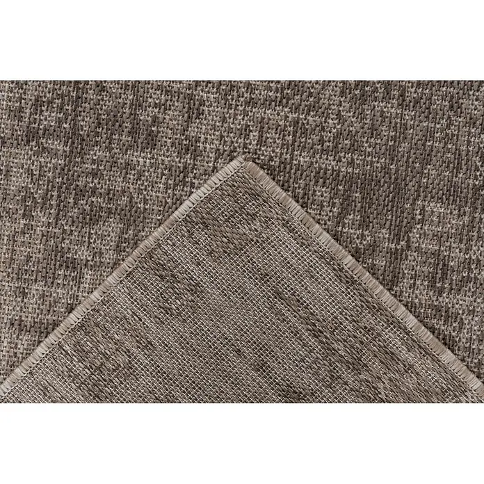 Kayoom Outdoor-Teppich Nibru 625 - Taupe, 290 x 200 cm, 100 % Polypropylen - Hellbrauner texturierter Webteppich, eine Ecke zurückgeklappt, um die Unterseite zu zeigen.