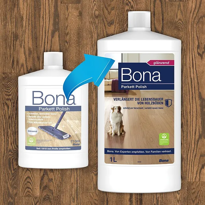 Bona Pflegemittel Parkett Polish - 1 l, Glänzend, Parkett - Zwei weiße Bona Parkett Polish Flaschen auf Holzfußboden; blauer Pfeil zeigt Übergang von 710ml zu 1L Flasche.