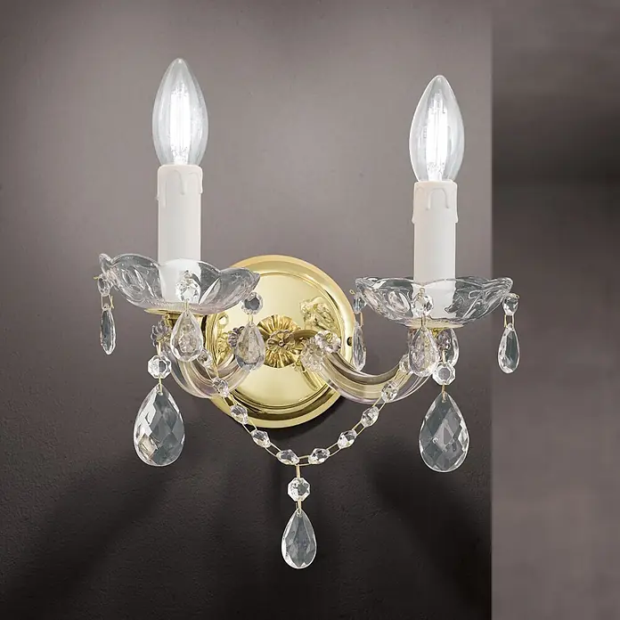 Orion Leuchten Wandleuchte - 40 W, L x B x H: 15 x 24 x 18 cm, E14 - Goldfarbene Wandleuchte mit zwei kerzenförmigen Lichtern und klaren Kristallverzierungen.
