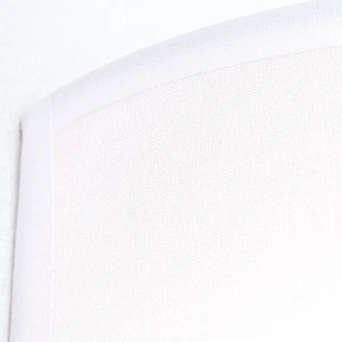 Orion Leuchten Wandleuchte - 9 W, L x B x H: 10 x 18 x 22 cm, E14 - Nahaufnahme von weißem Textil mit subtiler Webtextur.