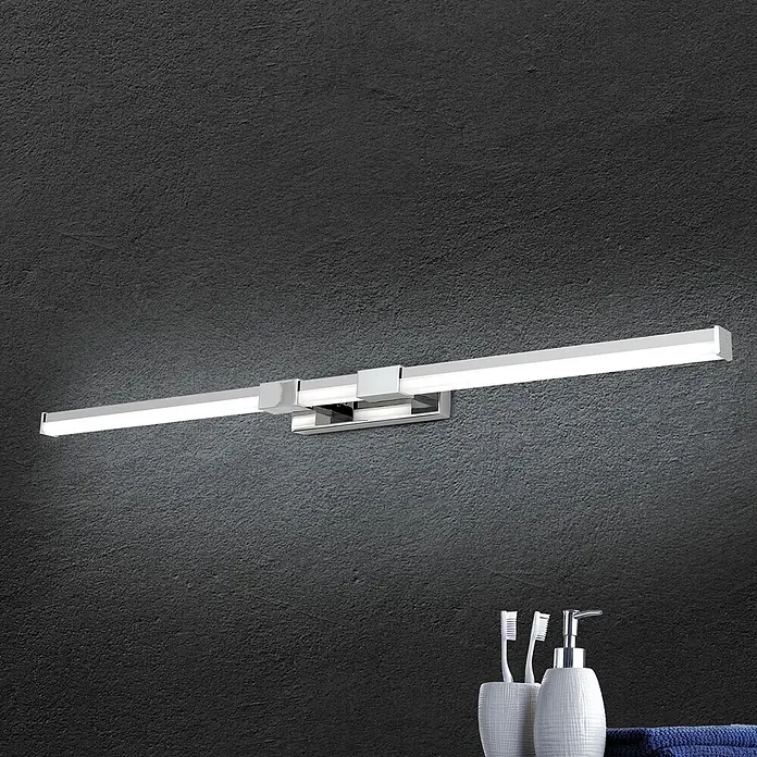 Orion Leuchten Wandleuchte - 17 W, L x B x H: 8 x 75 x 5 cm - Elegante Chrom-LED-Spiegelleuchte an dunkler Wand, beleuchtet darunterliegende Badaccessoires.