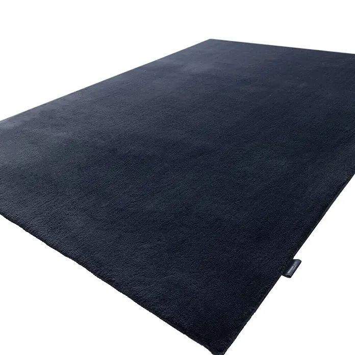 Kayoom Fellteppich Boundless 225 - Anthrazit, 170 x 120 cm, 90 % Polyester, 10 % Baumwolle - Weicher, dunkelblauer Plüschteppich mit Etikett.