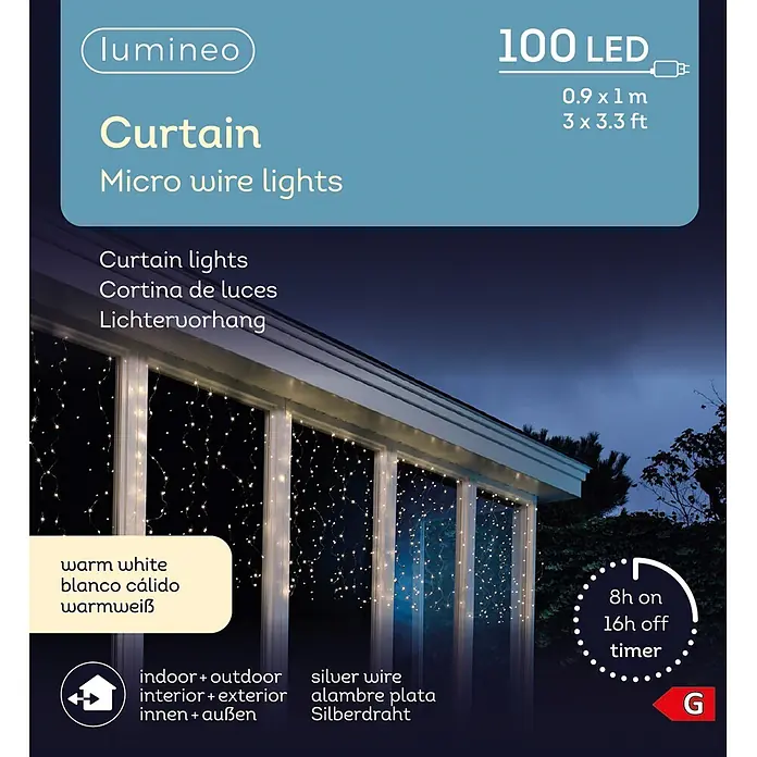 Lumineo Cascada de luz LED Curtain - Para exterior, Blanco cálido, Número de bombillas: 100 ud., Ancho: 90 cm - Cortina de luces LED micro hilo blanco cálido con hilo plateado, 0.9x1m, interior/exterior, colgada en una casa al anochecer con temporizador.