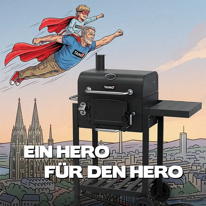 TAINO Smoker HERO klein BBQ Holzkohle-Grill Räucherofen Grillrost -  - Schwarzer Holzkohlegrill mit Thermometer, Seitenablage und Rädern, vor einem Bild von Comic-Superhelden.