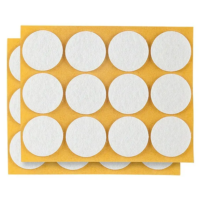 Stabilit Protector para muebles - Diámetro: 28 mm, Redonda, 24 ud. - Almohadillas de fieltro blancas sobre papel de soporte amarillo, ideales para proteger muebles y suelos de arañazos.