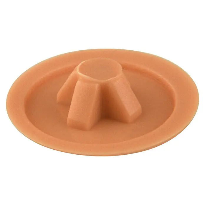 Stabilit Abdeckkappe - Geeignet für: Schraubenantrieb PZ 3, 30 Stk., Dunkelbeige - Nahaufnahme eines orangefarbenen Gummistopfens mit erhöhter Mitte und umlaufendem Rand, ideal zur Abdichtung von Löchern.