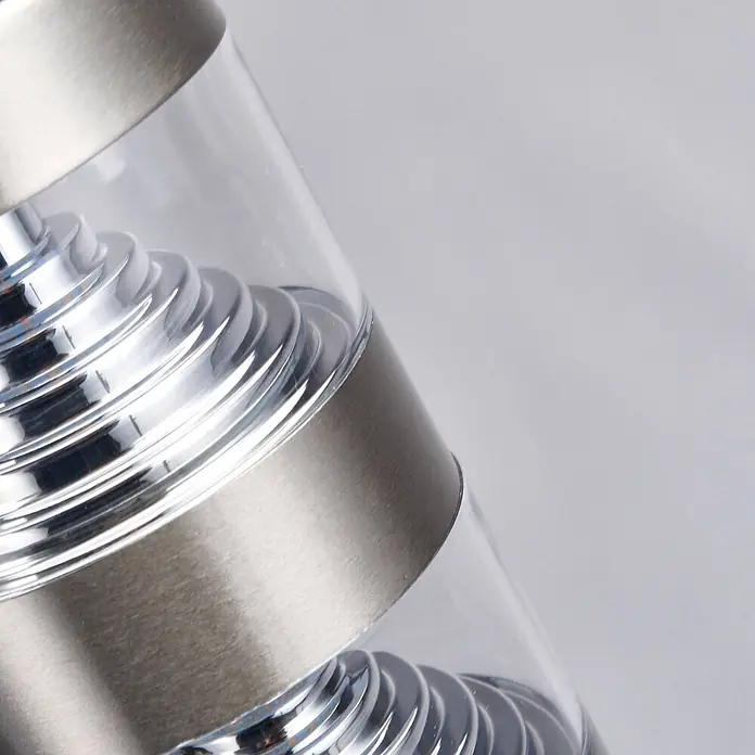 Lindby Edelstahl LED Wegeleuchte / Pollerleuchte 60 cm mit Bewegungsmelder -  - Moderne zylindrische Leuchte aus Klarglas mit gebürsteten Metallbändern und gestapelten, reflektierenden Spiralelementen.