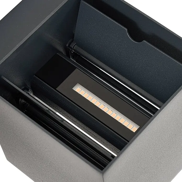Lindby LED Wandleuchte aussen in anthrazit, Aussenlampe Wand -  - Innenansicht einer dunkelgrauen LED-Außenwandleuchte mit warmweißer LED-Leiste und internen Blenden.