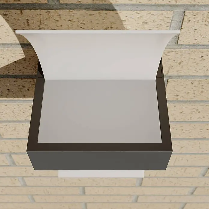 Lucande LED Wandleuchte aussen in graphit, weiß, Aussenlampe Wand -  - Dunkelgraue Wandleuchte mit geschwungener weißer Innenseite, an einer Ziegelwand montiert.