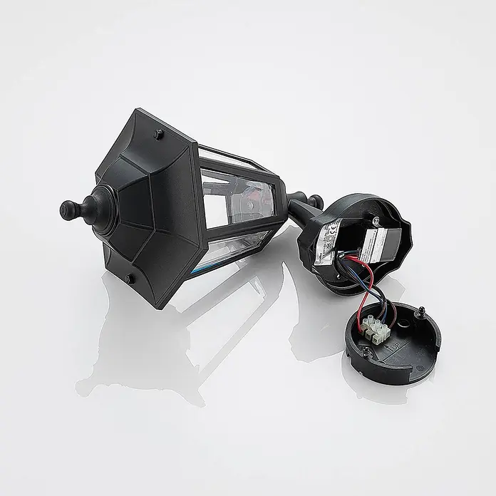 Lindby LED Wandleuchte aussen in schwarz, transparent, mit Bewegungsmelder, -  - Schwarze zerlegte Außenwandleuchte im Laternenstil, mit sichtbarer Verkabelung und Klemmenblock.