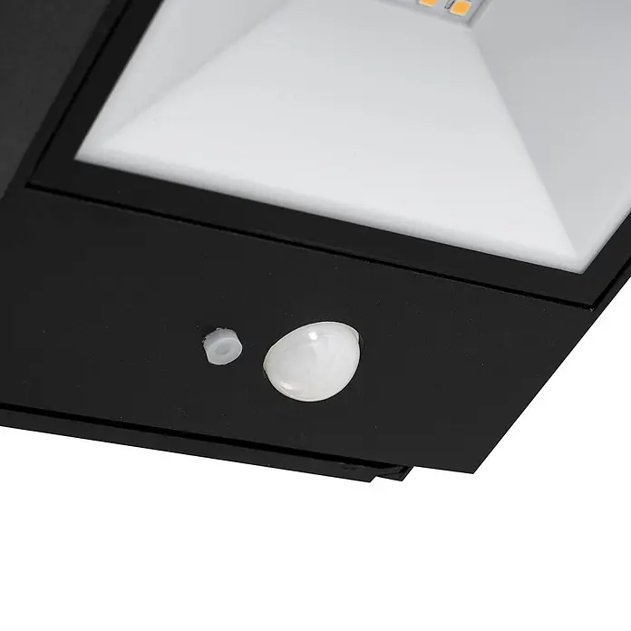 Lucande LED Solar Wandleuchte aussen in schwarz, transparent, mit -  - Schwarzer LED-Fluter mit weißer Abdeckung und integriertem Bewegungssensor.