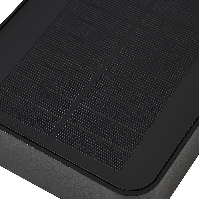 Lucande LED Solar Wandleuchte aussen in schwarz, transparent, mit -  - Nahaufnahme eines schwarzen Solarpanels mit sichtbaren Photovoltaikzellen und strukturiertem Rahmen.