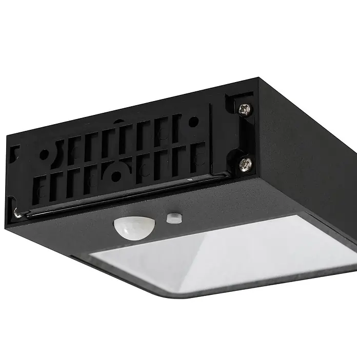 Lucande LED Solar Wandleuchte aussen in schwarz, transparent, mit -  - Nahaufnahme einer schwarzen Solar-Außenleuchte mit weißem Bewegungssensor und Leuchtfläche.