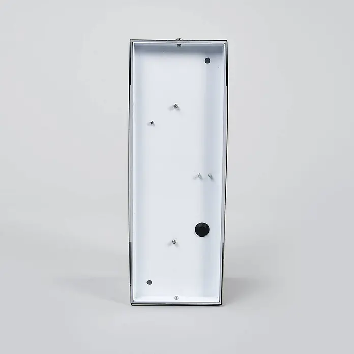 Lindby Edelstahl Wandlampe aussen, 1x 6,5W LED, Außenleuchte -  - Weißes rechteckiges Metallgehäuse mit internen Befestigungspfosten und schwarzem Gummistopfen.
