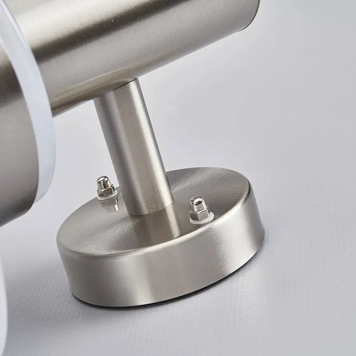 Lindby LED Wandlampe / Wandleuchte außen, Edelstahl, Kunststoff, 8,1W LED -  - Gebürstete Edelstahl-Montagebasis mit zylindrischem Arm und zwei Hutmuttern.