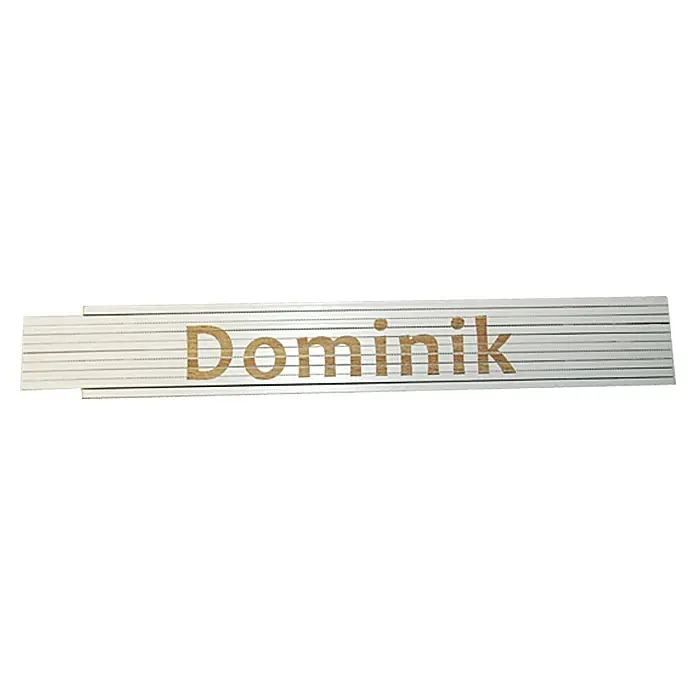 Zollstock - Aufdruck: Dominik, 2 m - Das Bild zeigt einen Zollstock mit dem Namen "Dominik" in brauner Schrift, ein praktisches Werkzeug für genaue Messungen.