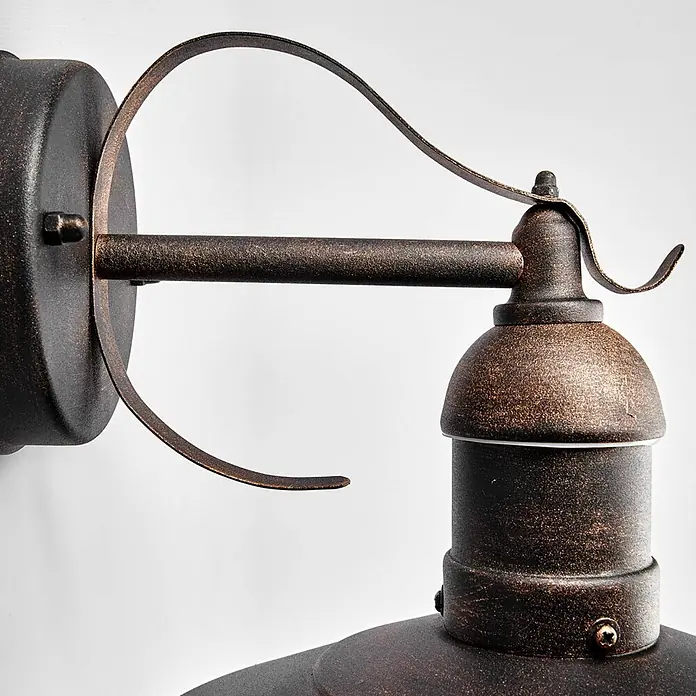 Lindby Edelstahl LED Wandlampe aussen Antik Look, LED Wandleuchte außen -  - Distressed antike Bronzewandleuchte mit gebogenem Stützarm und detailliertem Lampenkopf.