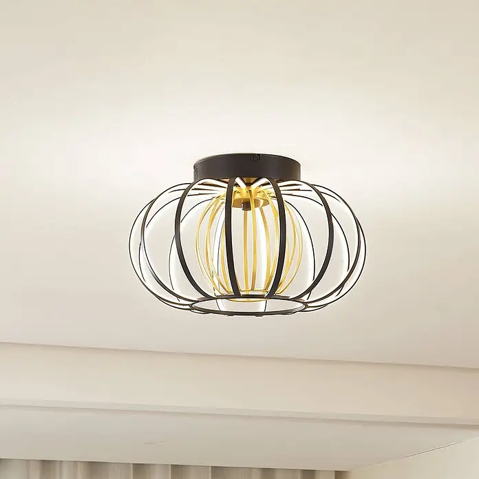 Lucande LED Deckenlampe in schwarz, gold, dimmbar Deckenleuchte rund -  - Moderne schwarze und goldene Deckenleuchte mit filigranem Käfigdesign und weißem Diffusor.
