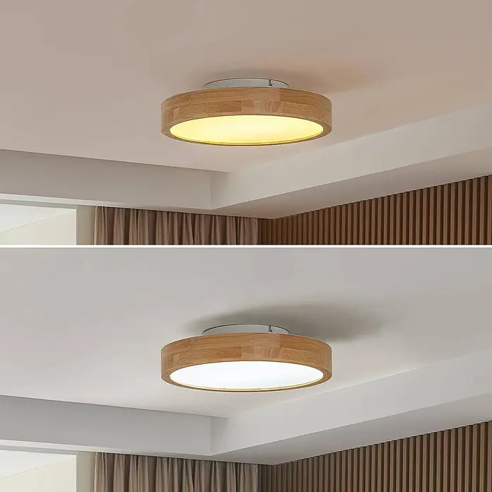 Lindby LED Deckenlampe in holz, weiß, dimmbar Deckenleuchte rund -  - Eine runde Deckenleuchte mit hellem Holzrahmen, mit warmem Gelb- und kühlem Weißlicht gezeigt.