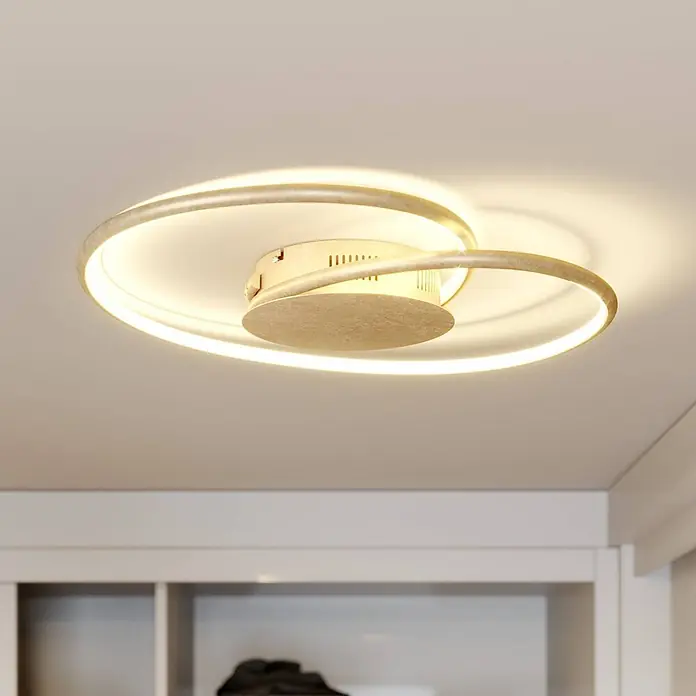 Lindby LED Deckenlampe in gold, Deckenleuchte -  - Moderne champagnerfarbene LED-Deckenleuchte in Spiralform, die die Decke warm beleuchtet.