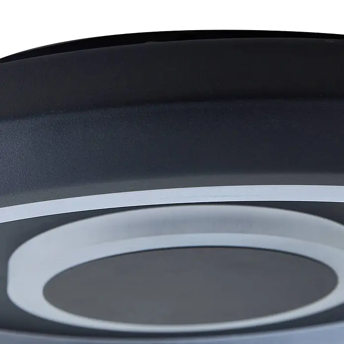 Lindby Deckenleuchte Lynden - schwarz - Nahaufnahme einer dunkelgrauen runden LED-Deckenleuchte mit weißem Innenring.