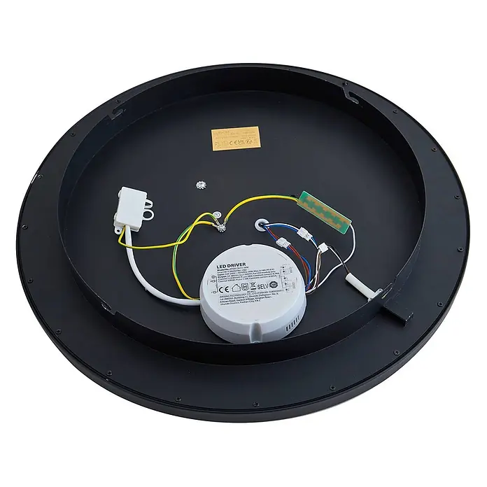 Lindby Deckenleuchte Lynden - schwarz - Innenansicht einer schwarzen runden LED-Deckenleuchte mit weißem LED-Treiber und elektrischen Verdrahtungsanschlüssen.