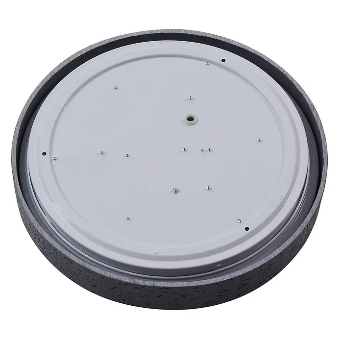 Lindby Deckenleuchte Manala - alu / grau / zink - Unteransicht einer runden LED-Deckenleuchte mit dunkelgrauem Beton-Gehäuse und hellgrauer Innenplatte mit kleinen Lichtpunkten.