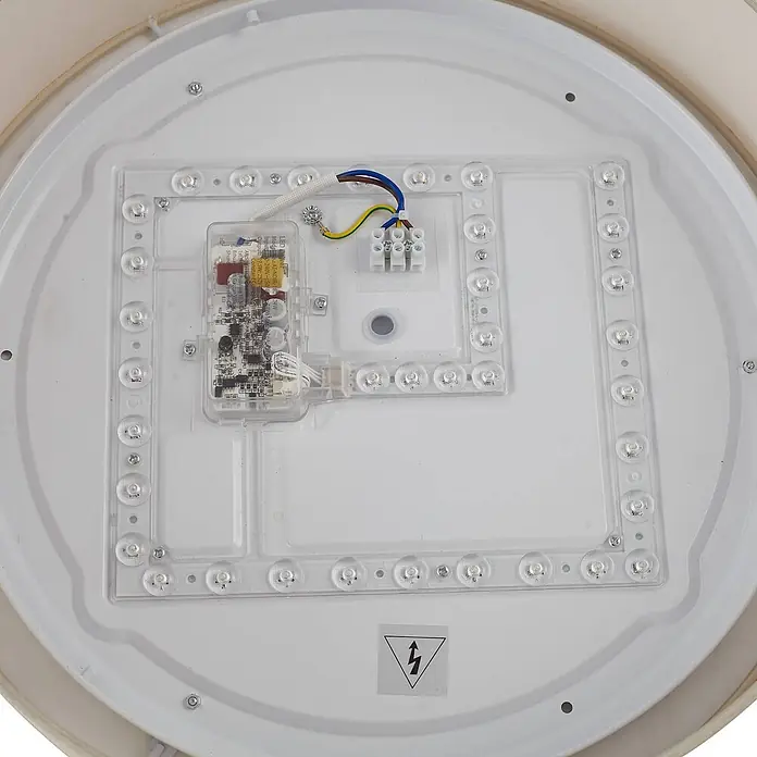 Lindby LED Deckenlampe in beige, Deckenleuchte -  - Innenansicht einer runden LED-Deckenleuchte, mit LED-Array, Treiberplatine und Verkabelung auf weißer Basis.