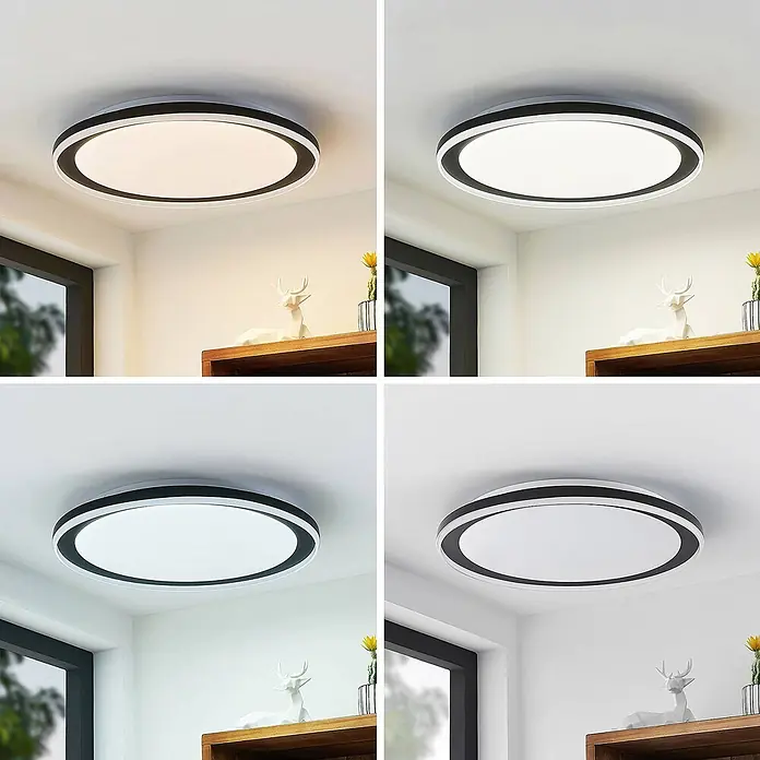 Lindby Deckenleuchte Verdan - schwarz - Eine moderne runde schwarz-weiße LED-Deckenleuchte, an einer Decke montiert, die verschiedene Lichtfarbtemperaturen in einem Raum anzeigt.