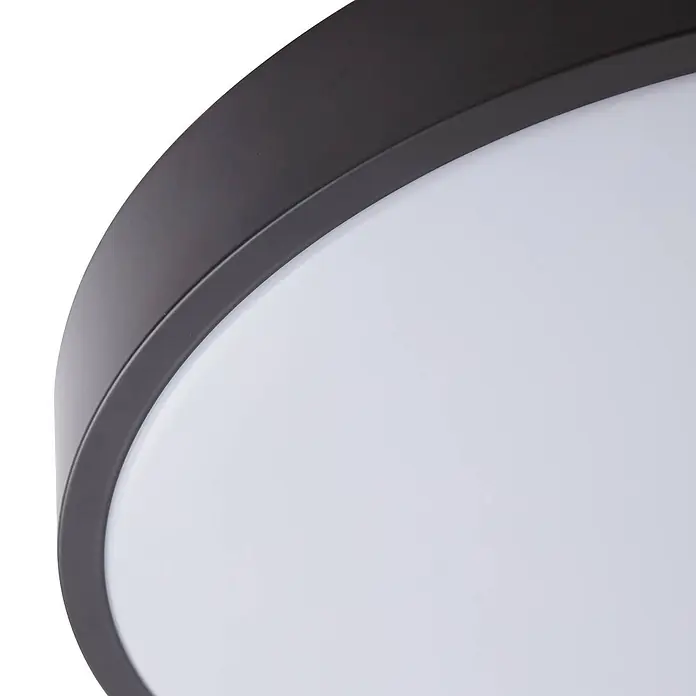 Lindby LED Deckenlampe in schwarz, Deckenleuchte rund -  - Nahaufnahme einer runden Deckenleuchte mit dunkelbraunem Metallrahmen und weißem Lichtdiffusor.