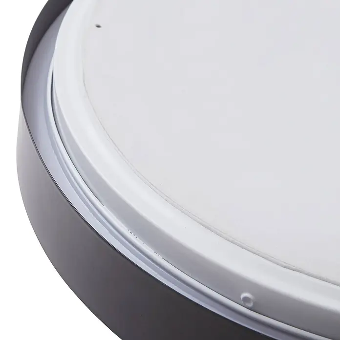 Lindby LED Deckenlampe in schwarz, Deckenleuchte rund -  - Nahaufnahme einer runden, dunkelgrauen Deckenleuchte mit weißem Diffusor.