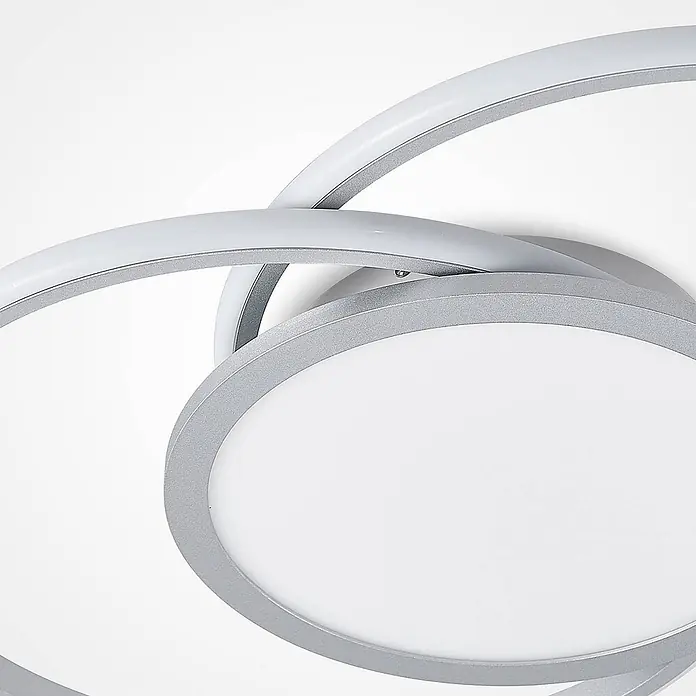 Lucande Deckenleuchte Senne - alu / grau / zink - Moderne, silberfarbene LED-Deckenleuchte mit verschlungenen Ringen und weißen Diffusoren.