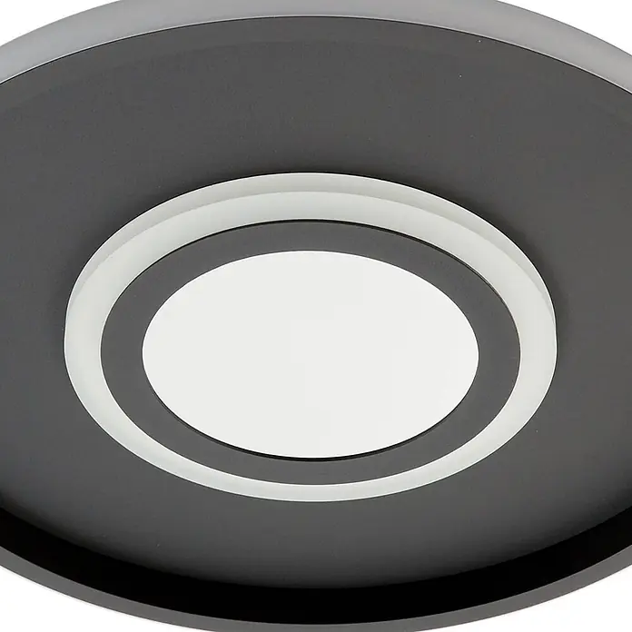 Lindby Deckenleuchte Selian - schwarz, schwarz - Moderne runde LED-Deckenleuchte in Dunkelgrau mit weißem, durchscheinendem Innenring und beleuchteter weißer Mitte.