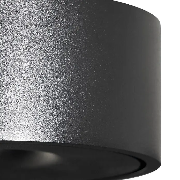 Arcchio LED Deckenlampe in schwarz, Deckenleuchte rund -  - Dunkelgraues zylindrisches Produkt mit feiner körniger Textur.