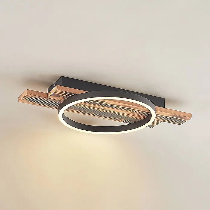 Lindby LED Deckenlampe in holz, dimmbar Deckenleuchte rund -  - Schwarze LED-Deckenleuchte aus Holz mit leuchtendem Ring und rechteckigen Holzlamellen, an der Decke montiert.