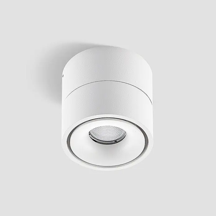 Arcchio LED Deckenlampe Ø 10 cm, Deckenstrahler 350° drehbar, -  - Weißer zylindrischer Aufbau-Strahler mit strukturierter Oberfläche und eingelassener LED-Lichtquelle.