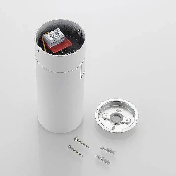 Arcchio LED Deckenlampe in weiß, Deckenstrahler -  - Weißes zylindrisches Leuchtengehäuse mit freiliegendem Klemmblock, einer separaten silbernen Montagehalterung, Schrauben und Dübeln.